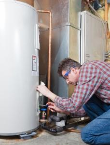 one of our El Cerrito water heater repair techs is fixing a broken water heater